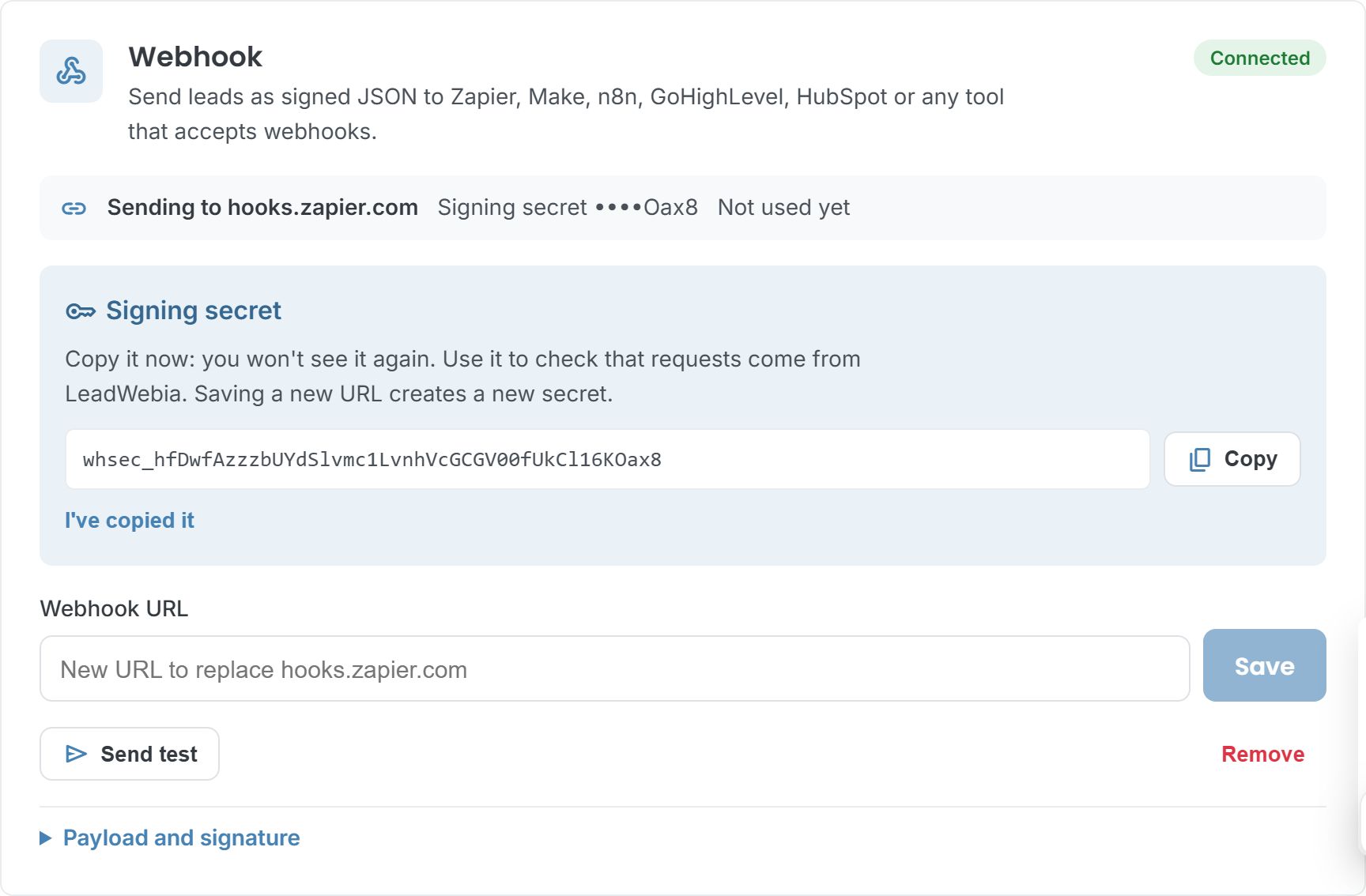 The Webhook card in LeadWebia Integrations with a saved URL and its signing secret